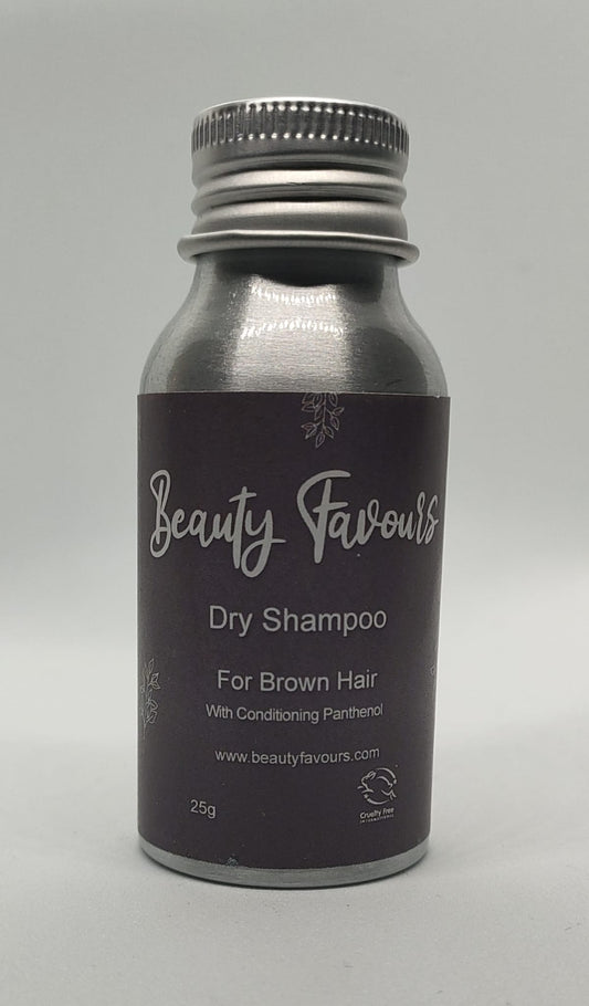 Bottle of Beauty Favours dry shampoo for brown hair on a gray background